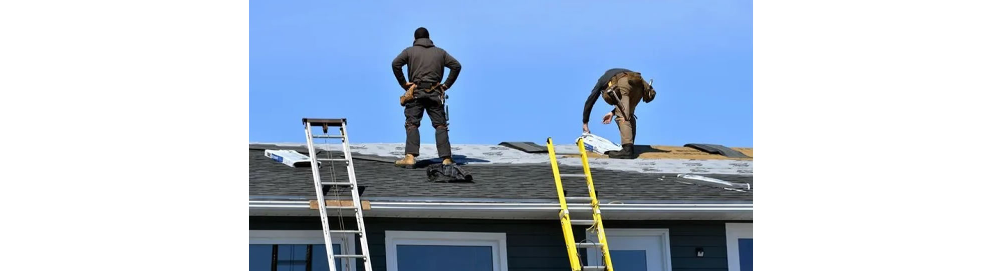 men working on roof